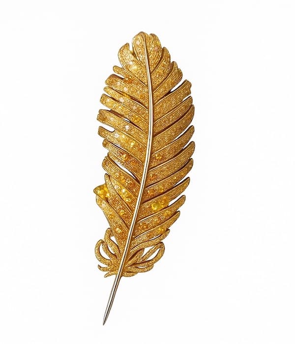 Broche pluma dorada Broche pluma dorada